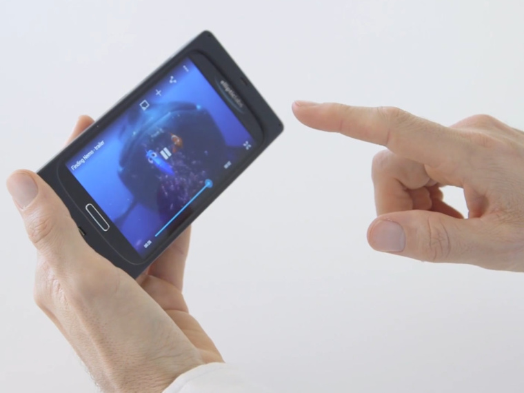 Finger reaching to touch the screen where the UI appears as the finger approaches